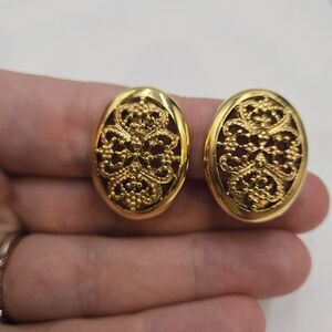 Vintage 1928 Jewelry Brand Gold Tone Filigree Domed Clip On Oval Earrings